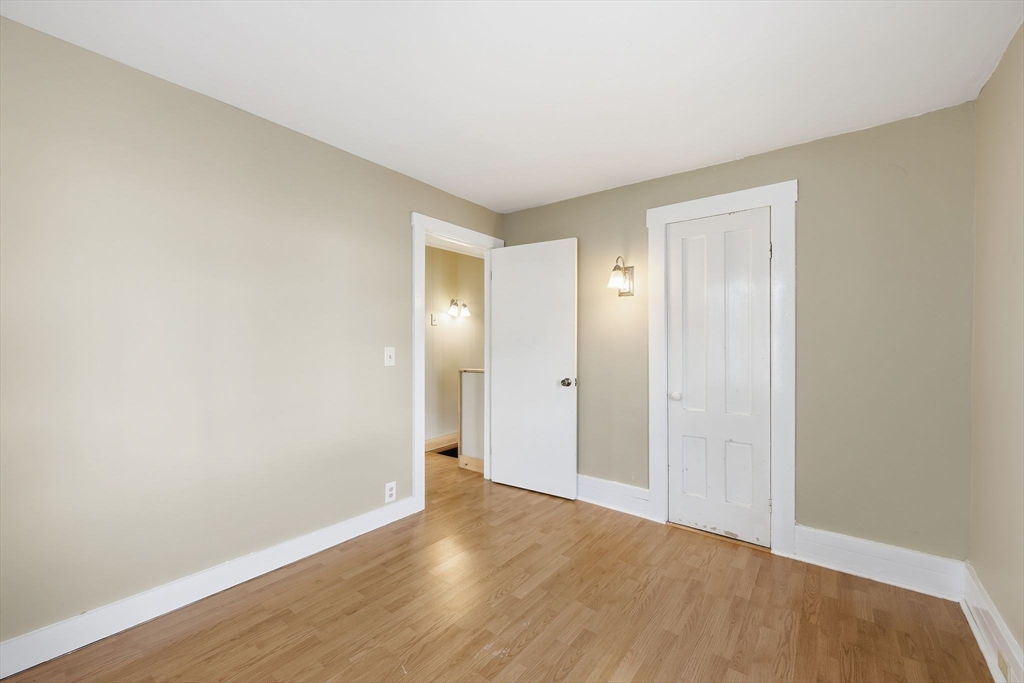 36 Sullivan Avenue Hardwick, MA 01031 - Photo 31 of 42 a view of an empty room with wooden floor