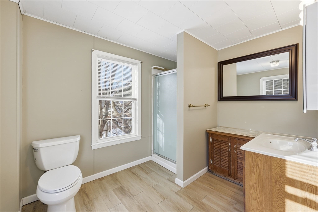 36 Sullivan Avenue Hardwick, MA 01031 - Photo 34 of 42 a bathroom with a toilet sink and mirror