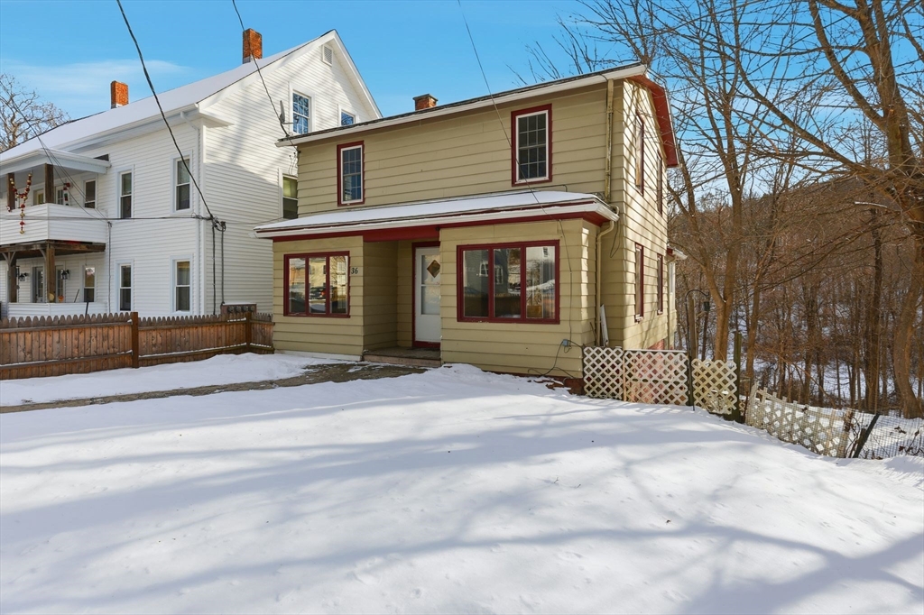 36 Sullivan Avenue Hardwick, MA 01031 - Photo 37 of 42 a front view of a house with a garden
