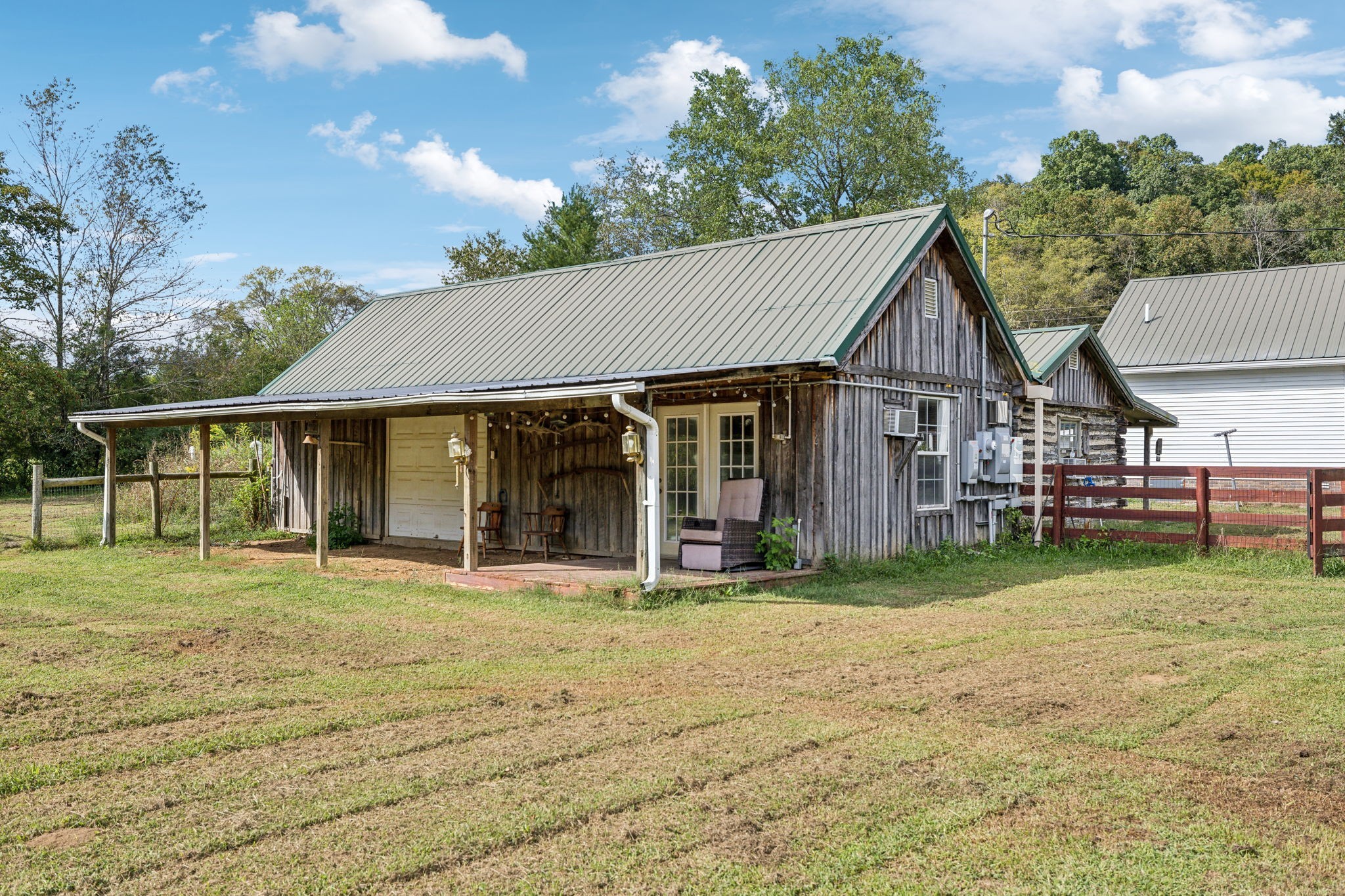 600 Blooming Grove Road Pulaski, TN 38478 - Photo 54 of 68 a front view of a house with a garden