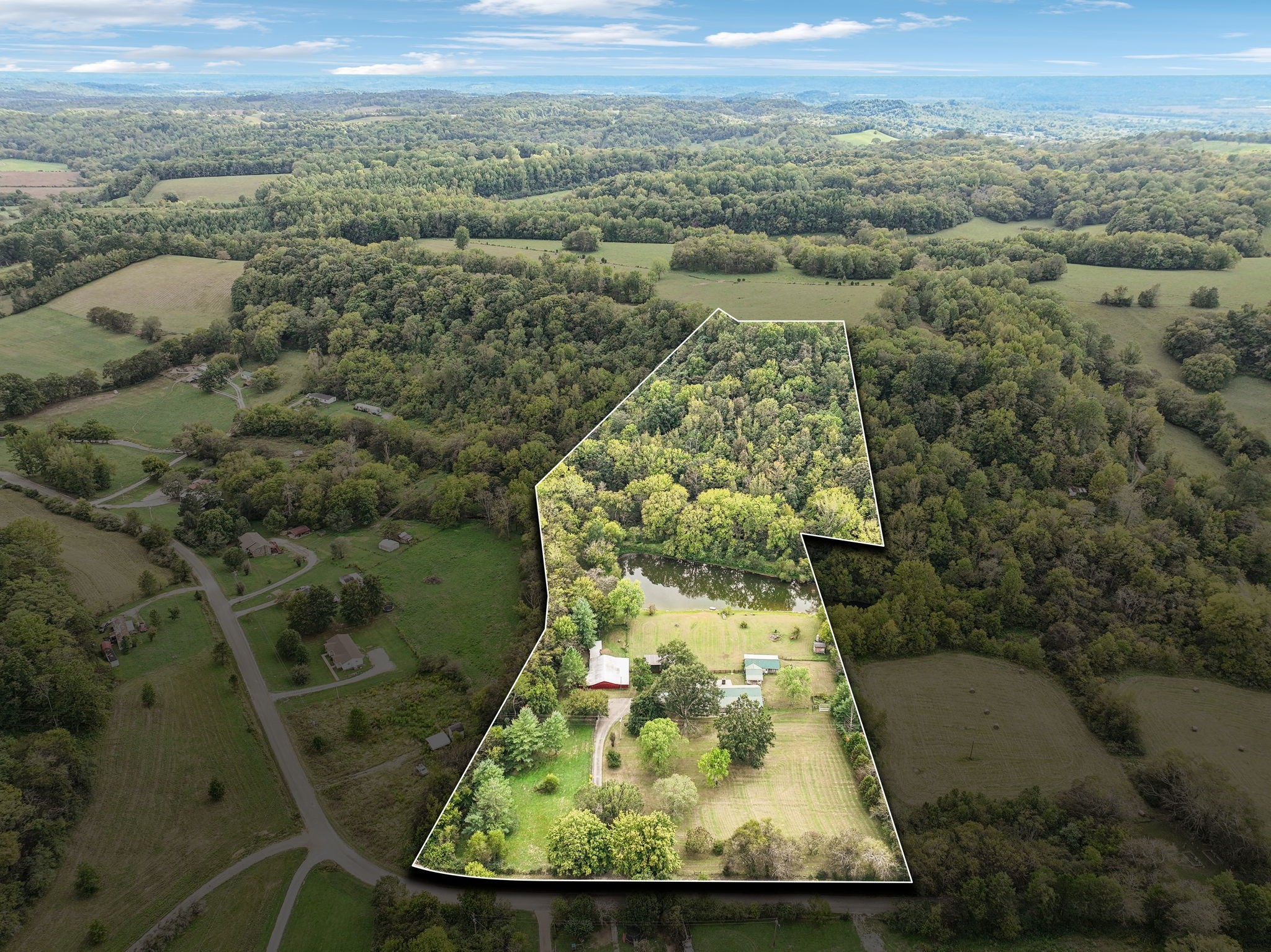 600 Blooming Grove Road Pulaski, TN 38478 - Photo 66 of 68 an aerial view of a residential houses with outdoor space