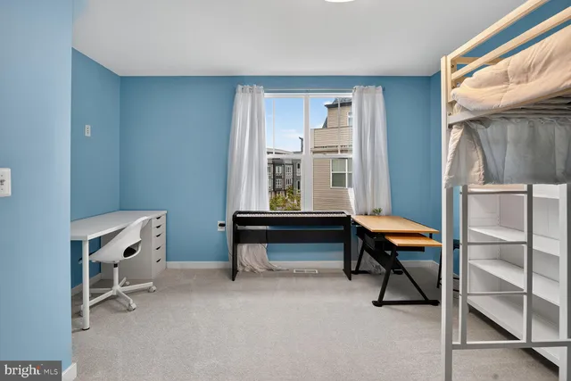 a view of a livingroom with entryway