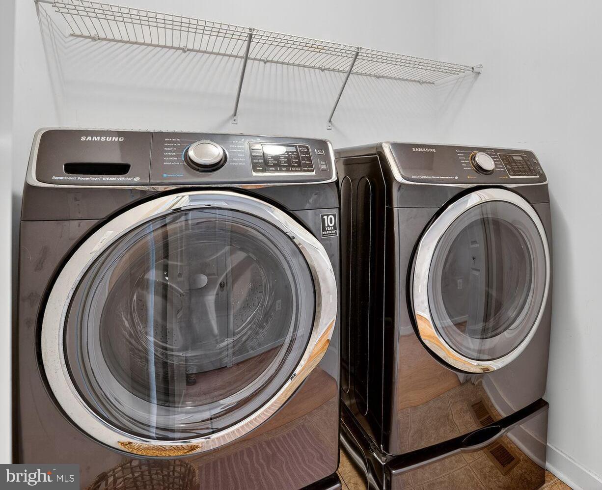 1449 Trafalgar Lane Frederick, MD 21701 - Photo 17 of 28 a utility room with dryer and washer