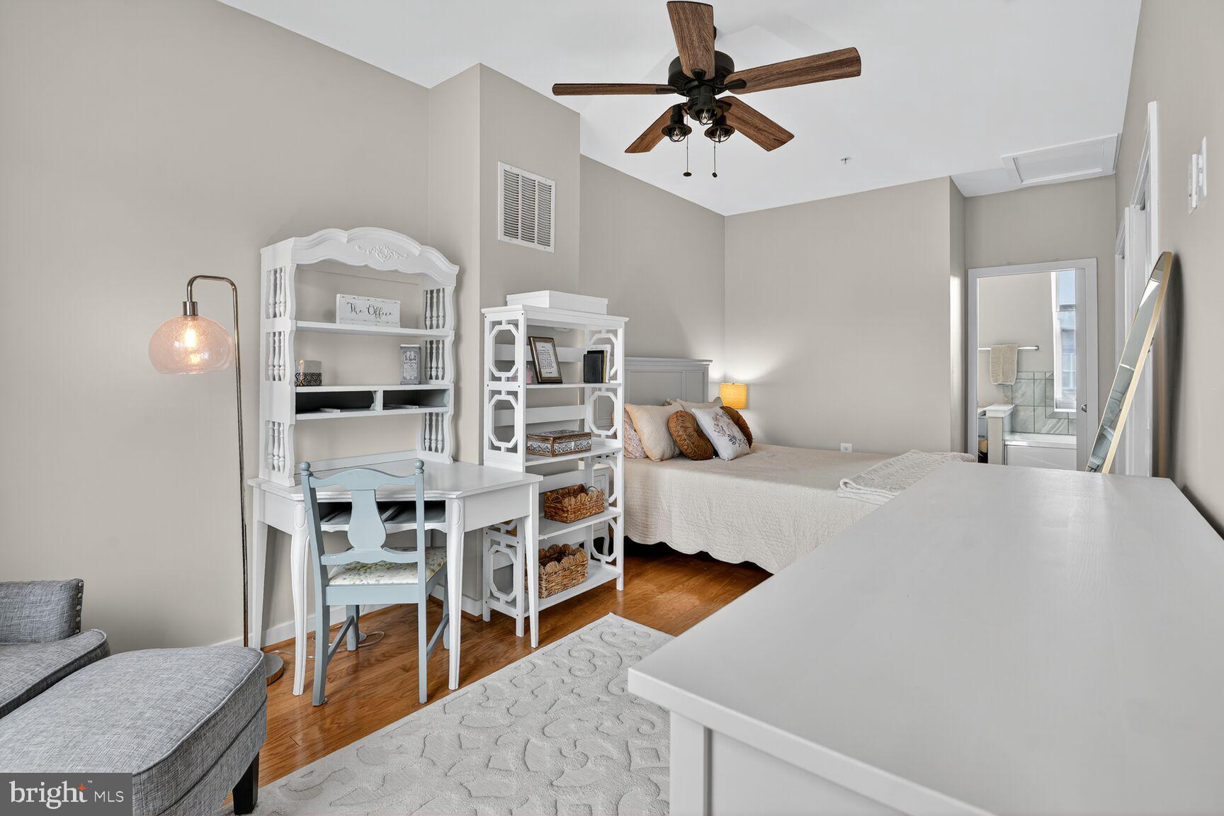 1449 Trafalgar Lane Frederick, MD 21701 - Photo 21 of 28 a bedroom with furniture and a bed