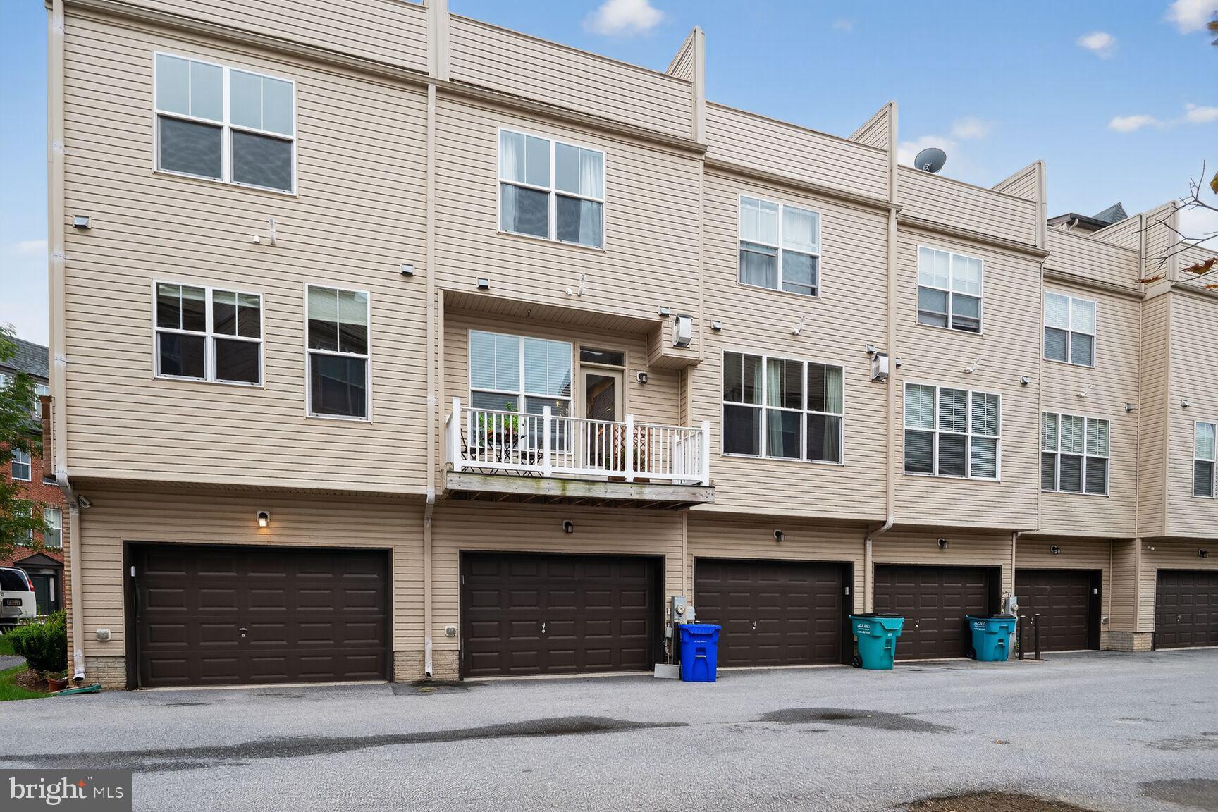 1449 Trafalgar Lane Frederick, MD 21701 - Photo 28 of 28 a front view of a building with a street