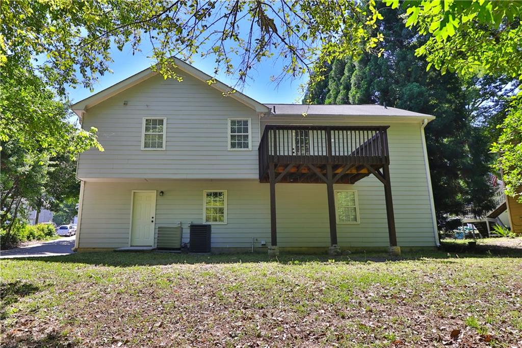 353 Fall View Court Winder, GA 30680 - Photo 7 of 61 a front view of a house with a yard