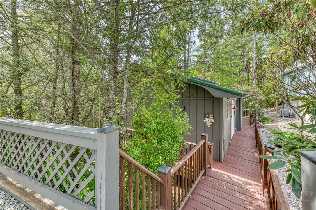 174 Spruce Pine Road Newland, NC 28657 - Photo 2 of 50 a view of a wooden fence and trees