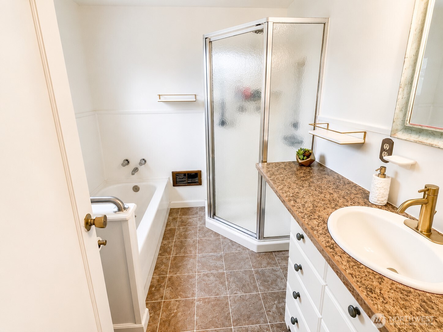 2154 Cranberry Road Grayland, WA 98547 - Photo 17 of 38 a bathroom with a granite countertop sink and a tub