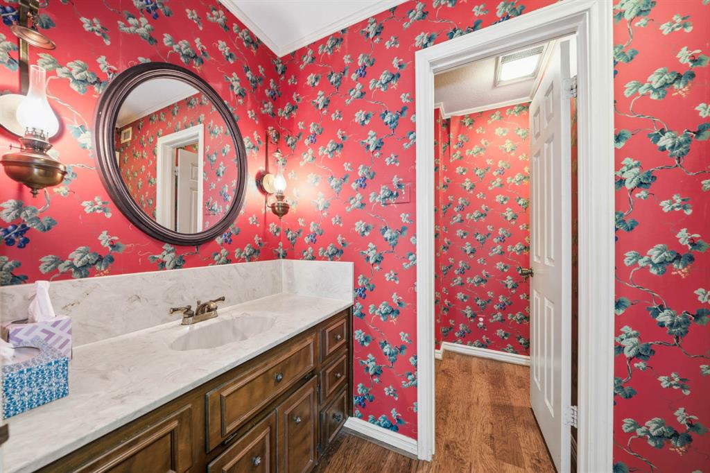 3400 Timbermill Road Waco, TX 76710 - Photo 22 of 35 a bathroom with a sink and a mirror
