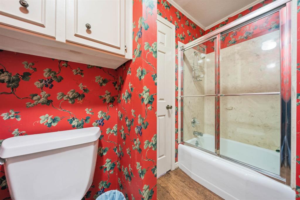 3400 Timbermill Road Waco, TX 76710 - Photo 24 of 35 a bathroom with a shower and a toilet