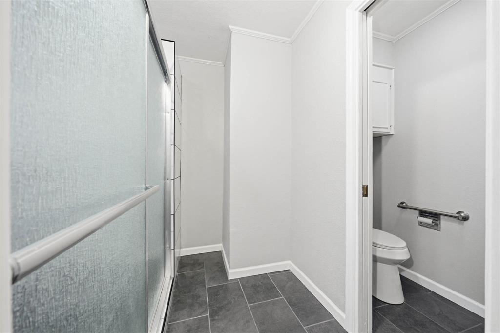 3400 Timbermill Road Waco, TX 76710 - Photo 25 of 35 a bathroom with a sink and toilet