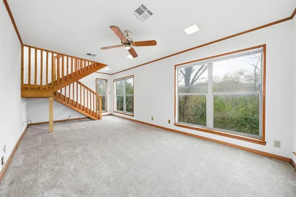 an empty room with windows