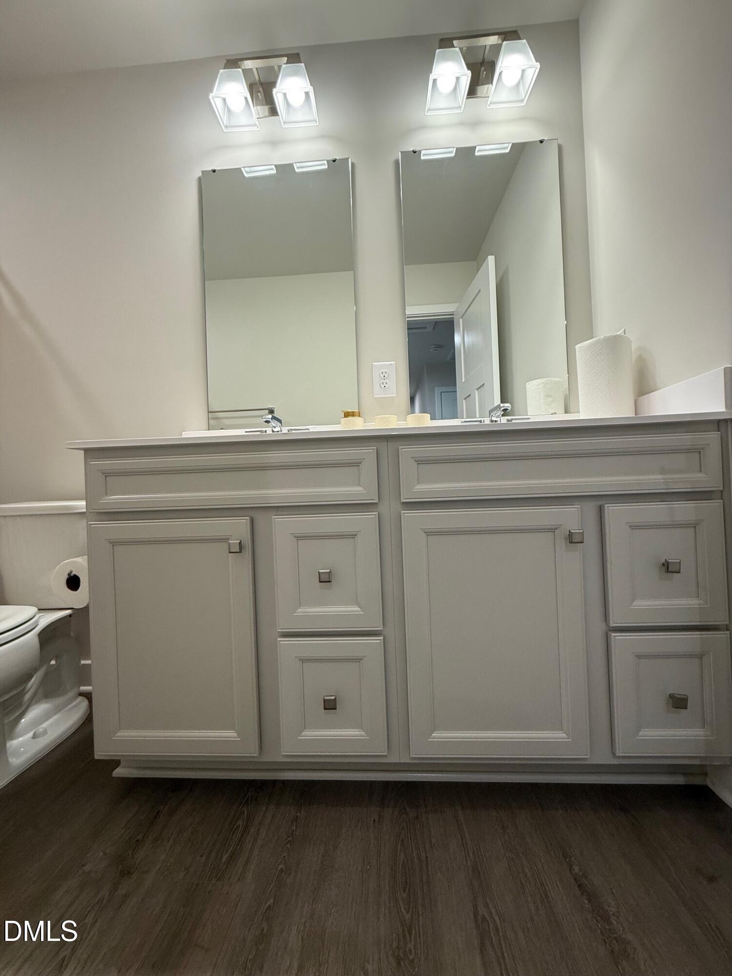 1362 Chowan Avenue Durham, NC 27713 - Photo 19 of 27 a bathroom with a sink and a mirror