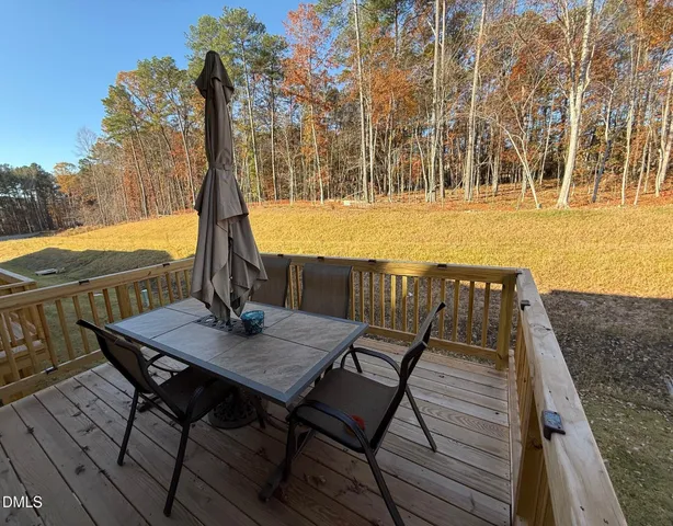 a view of a terrace with furniture