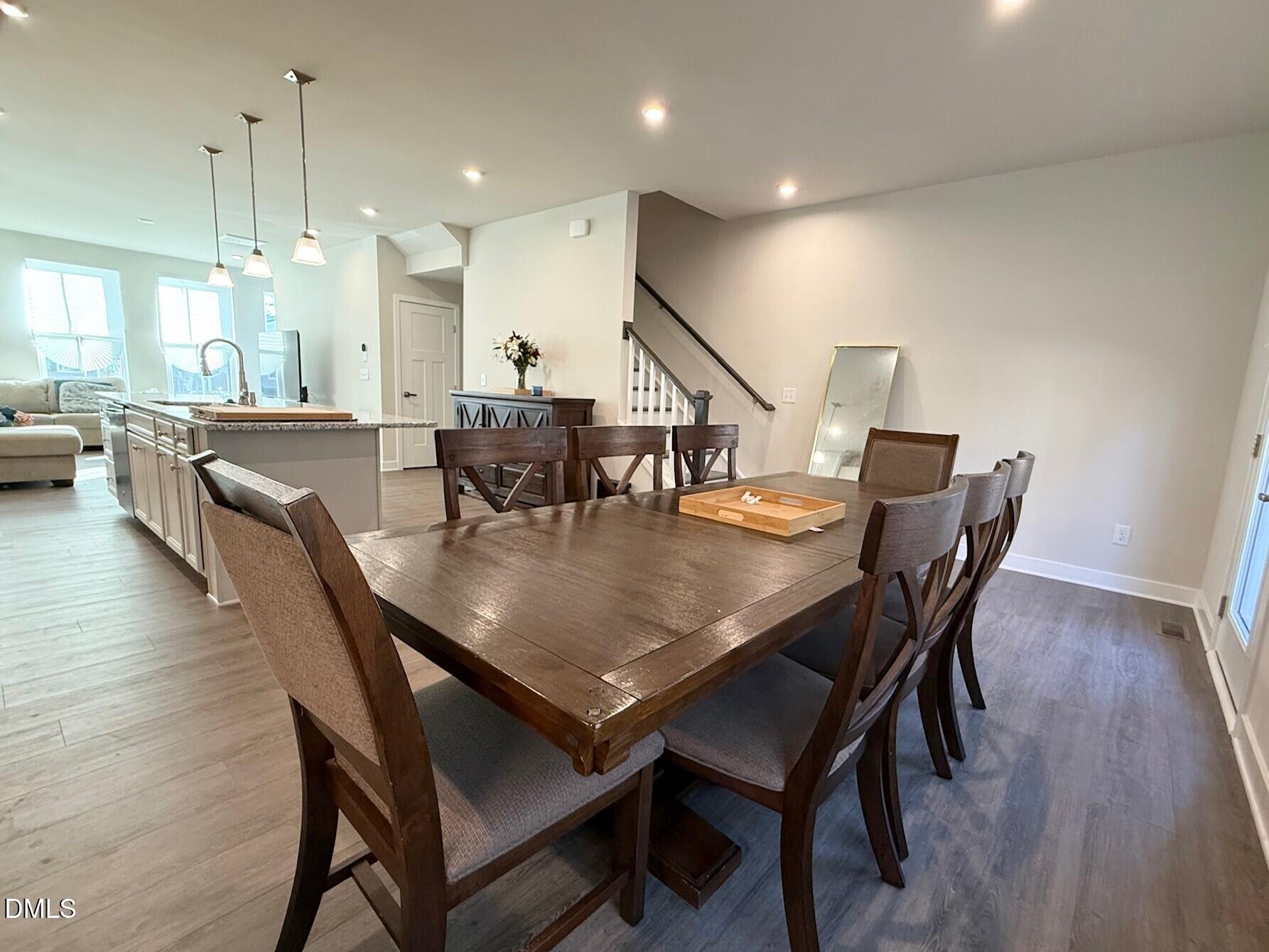1362 Chowan Avenue Durham, NC 27713 - Photo 10 of 27 a dining room with furniture and wooden floor