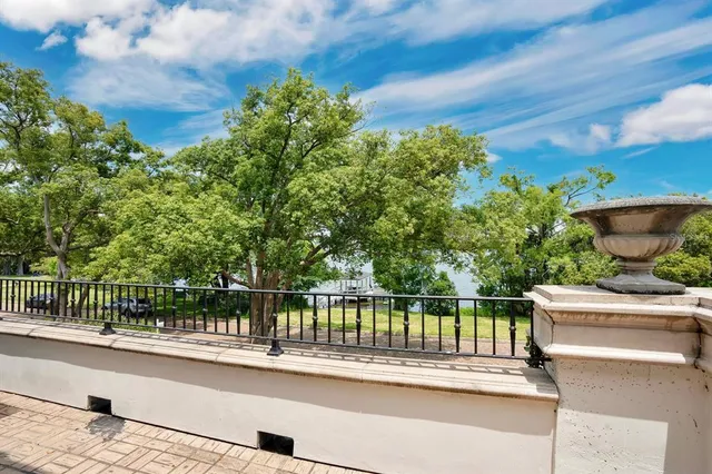 a view of a chairs on the roof deck