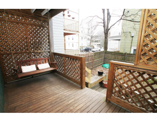 38 Maple Avenue, Unit 1 Cambridge, MA 02139 - Photo 9 of 10 a view of a porch with wooden floor