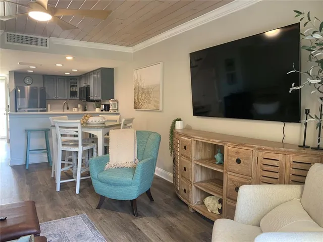 a view of a brick house with a balcony