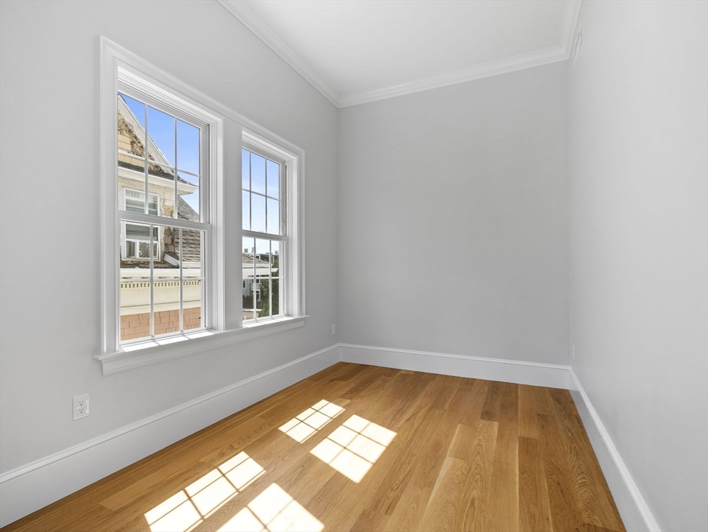 944 East Broadway, Unit 3 Boston, MA 02127 - Photo 14 of 33 a view of empty room with windows