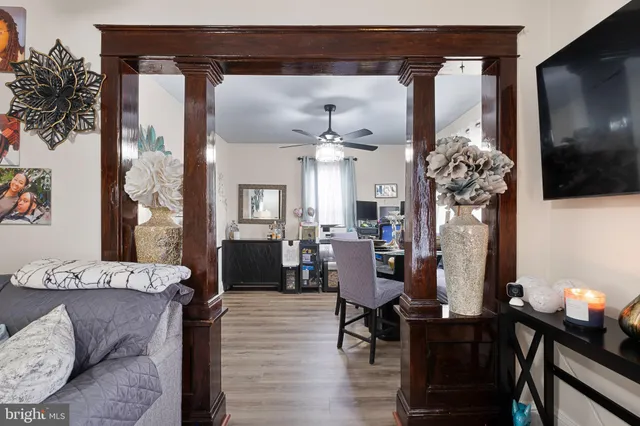 a view of a livingroom with furniture and a flat screen tv