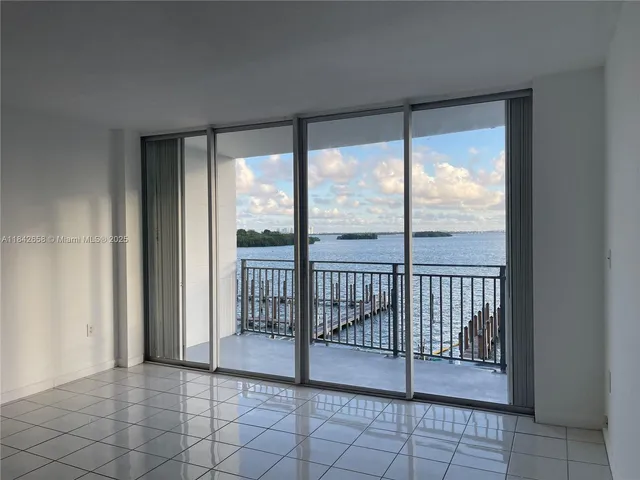 a view of a room with windows