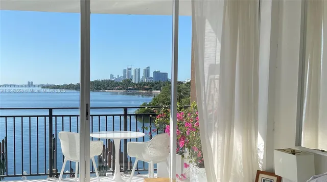 a view of a balcony with an ocean view