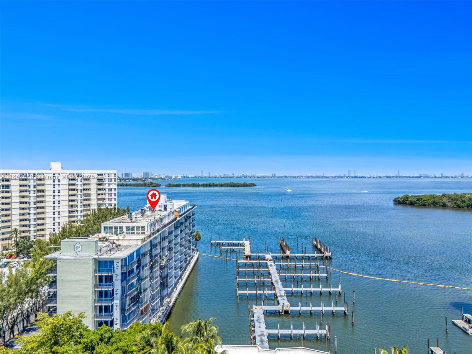 770 Northeast 69th Street, Unit 4H Miami, FL 33138 - Photo 8 of 18 a view of a city with tall buildings