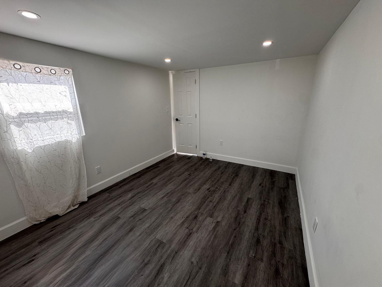 357 Hunting Club Avenue Clewiston, FL 33440 - Photo 16 of 37 a view of wooden floor