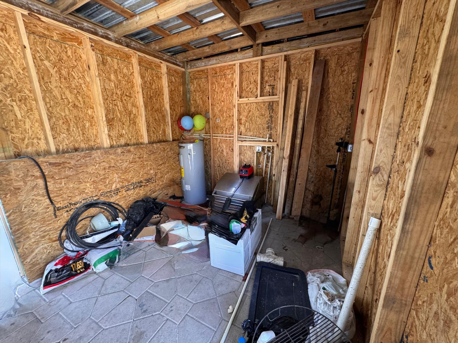 357 Hunting Club Avenue Clewiston, FL 33440 - Photo 31 of 37 a front view of a house with outdoor seating