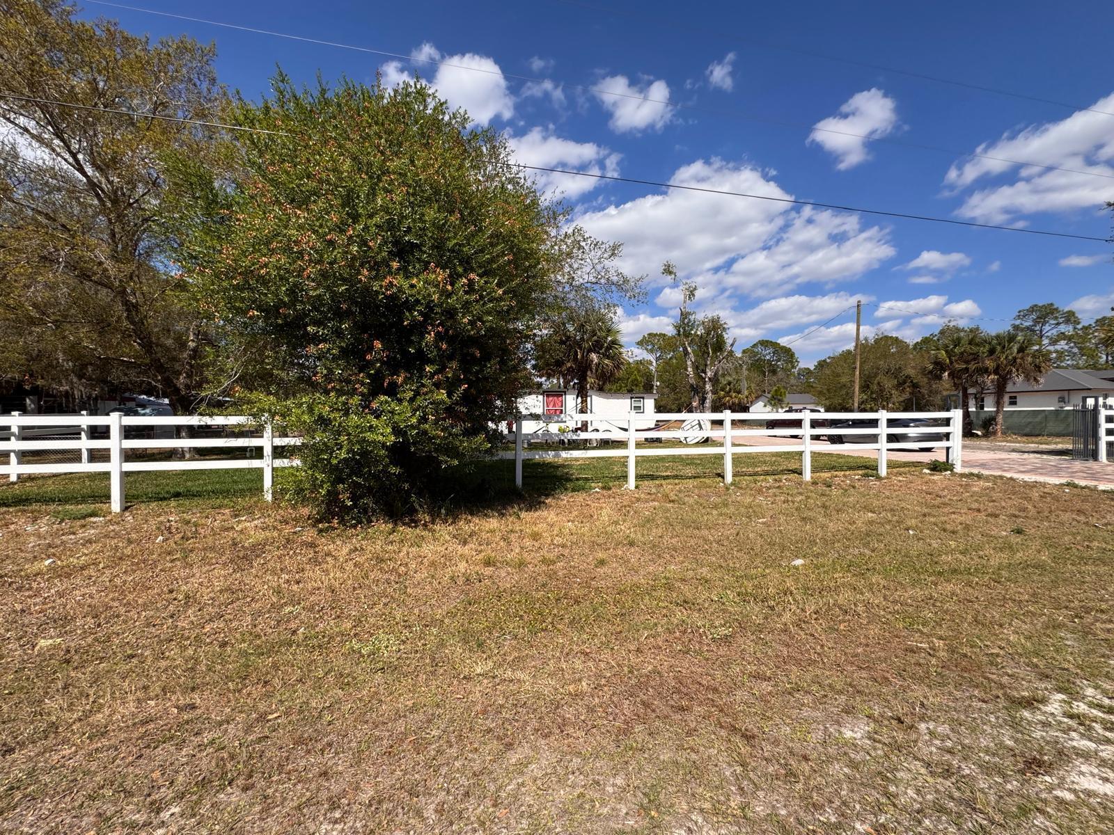357 Hunting Club Avenue Clewiston, FL 33440 - Photo 34 of 37 a view of lake with trees