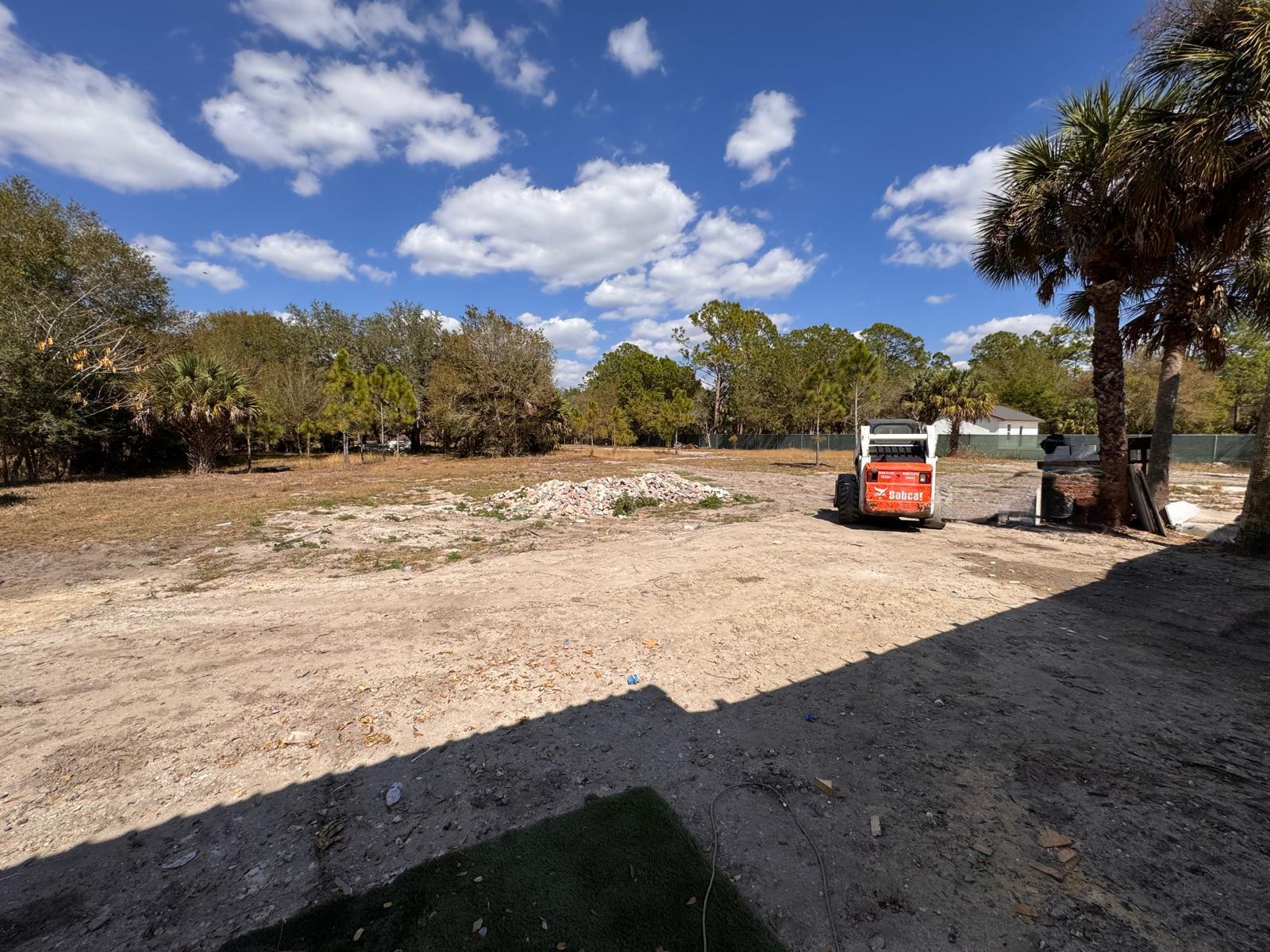 357 Hunting Club Avenue Clewiston, FL 33440 - Photo 36 of 37 a view of road with view of outdoor space and trees