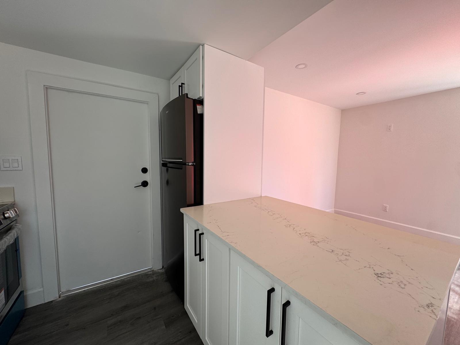 357 Hunting Club Avenue Clewiston, FL 33440 - Photo 6 of 37 a room with closet and wooden floor