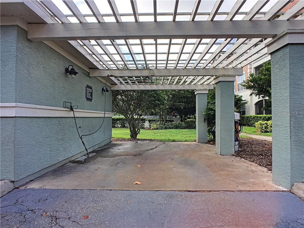 12824 Madison Pointe Circle, Unit 103 Orlando, FL 32821 - Photo 19 of 27 a view of a porch