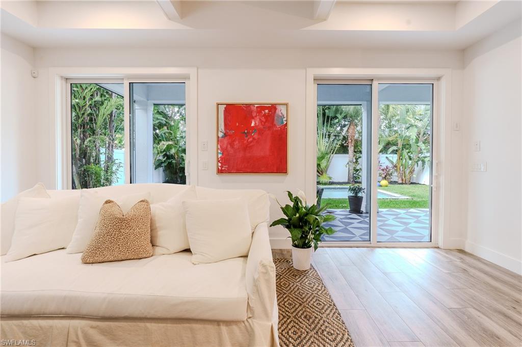 1075 Frank Whiteman Boulevard Naples, FL 34103 - Photo 11 of 43 Seamless indoor outdoor poolside living