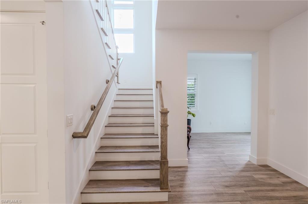 1075 Frank Whiteman Boulevard Naples, FL 34103 - Photo 22 of 43 So sunny - 2 tiered staircase