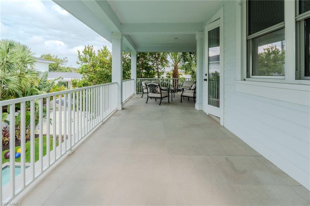 1075 Frank Whiteman Boulevard Naples, FL 34103 - Photo 28 of 43 This primary balcony is yours ...not the families !!!