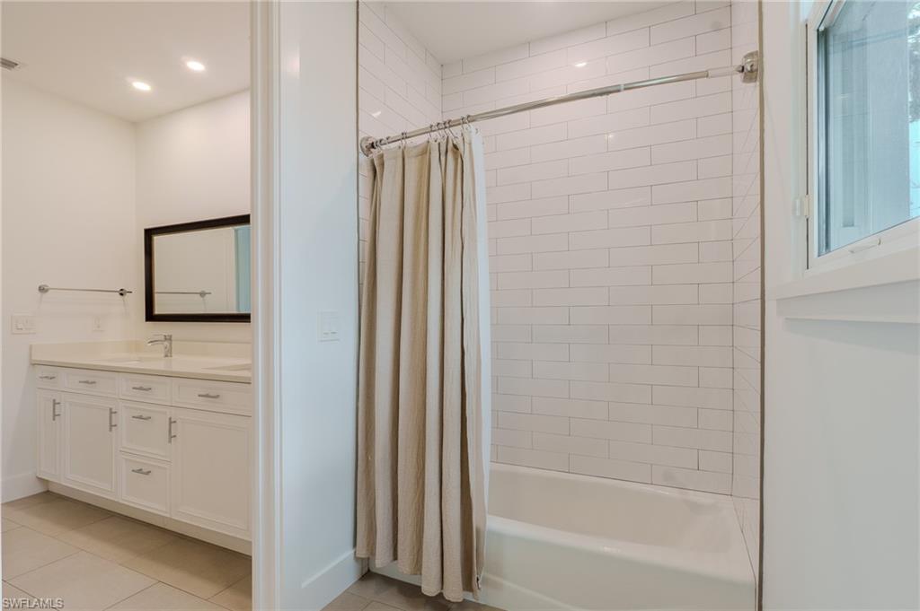 1075 Frank Whiteman Boulevard Naples, FL 34103 - Photo 36 of 43 The pocket sliding door enhances privacy w/o taking up space