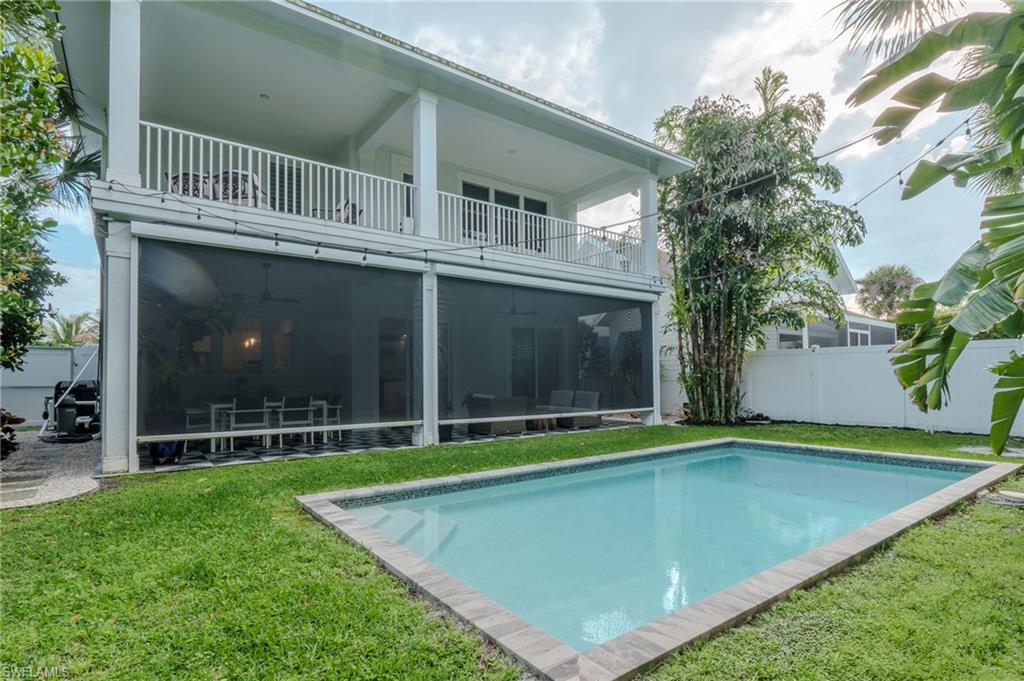 1075 Frank Whiteman Boulevard Naples, FL 34103 - Photo 43 of 43 Please note the STORM SAFE hurricane auto up/down screens