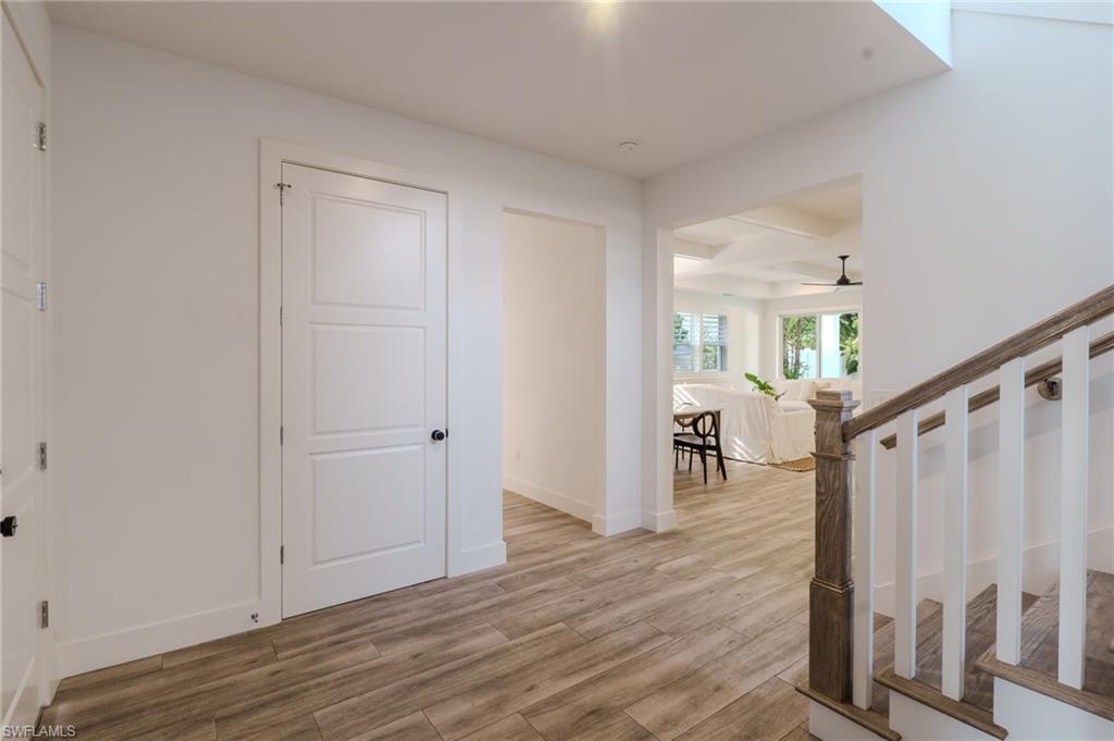 1075 Frank Whiteman Boulevard Naples, FL 34103 - Photo 6 of 43 The front foyer welcomes you with a private, elegant entrance.