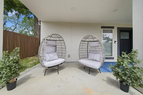a view of a two chairs in a room