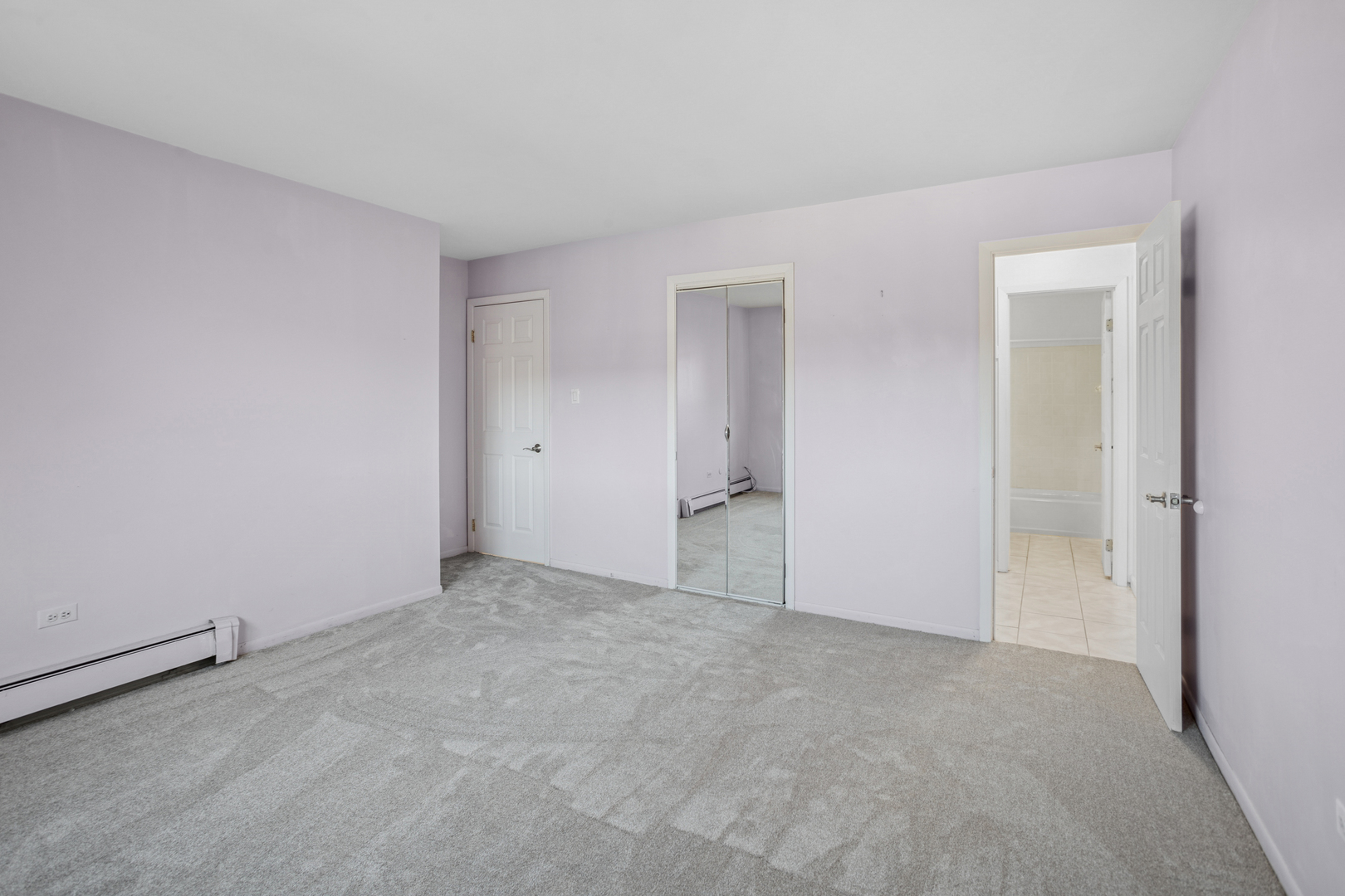 8905 Knight Avenue, Unit 211 Des Plaines, IL 60016 - Photo 17 of 24 an empty room with an entryway