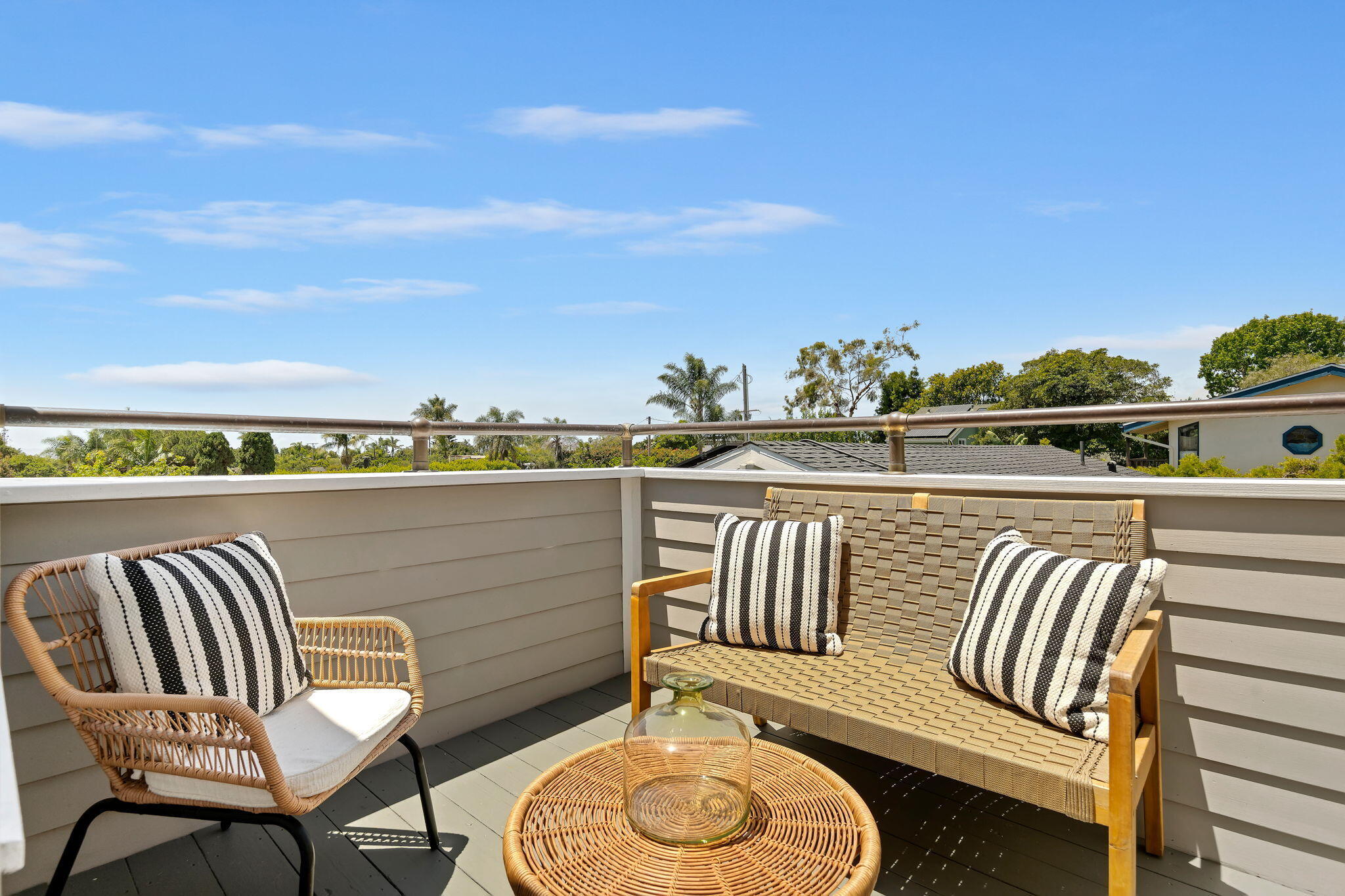 2129 Red Rose Way Santa Barbara, CA 93109 - Photo 16 of 44 a balcony with table and chairs