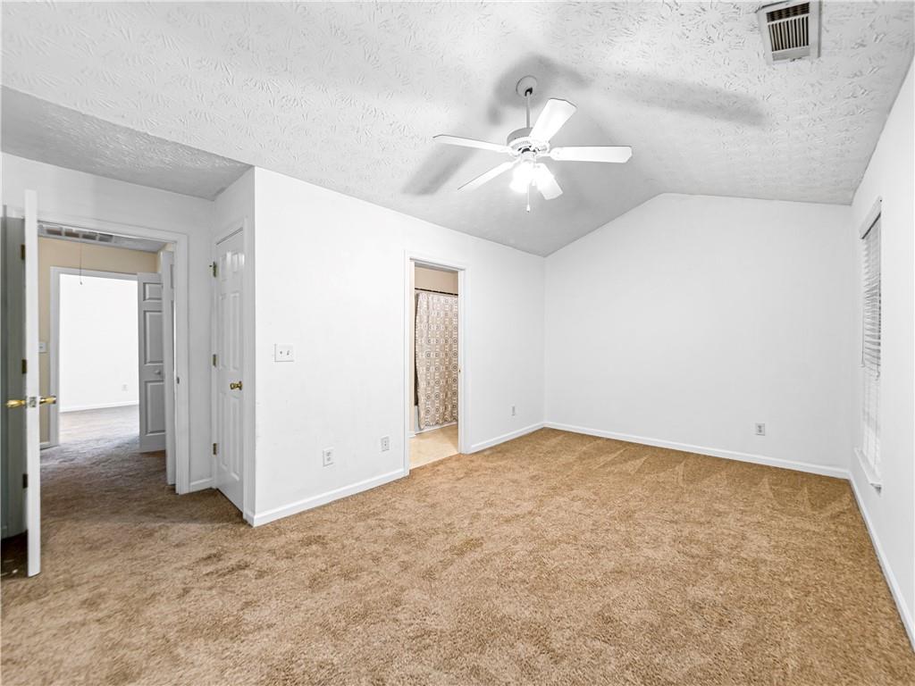2523 Walden Lake Drive Decatur, GA 30035 - Photo 16 of 19 an empty room with fan and windows