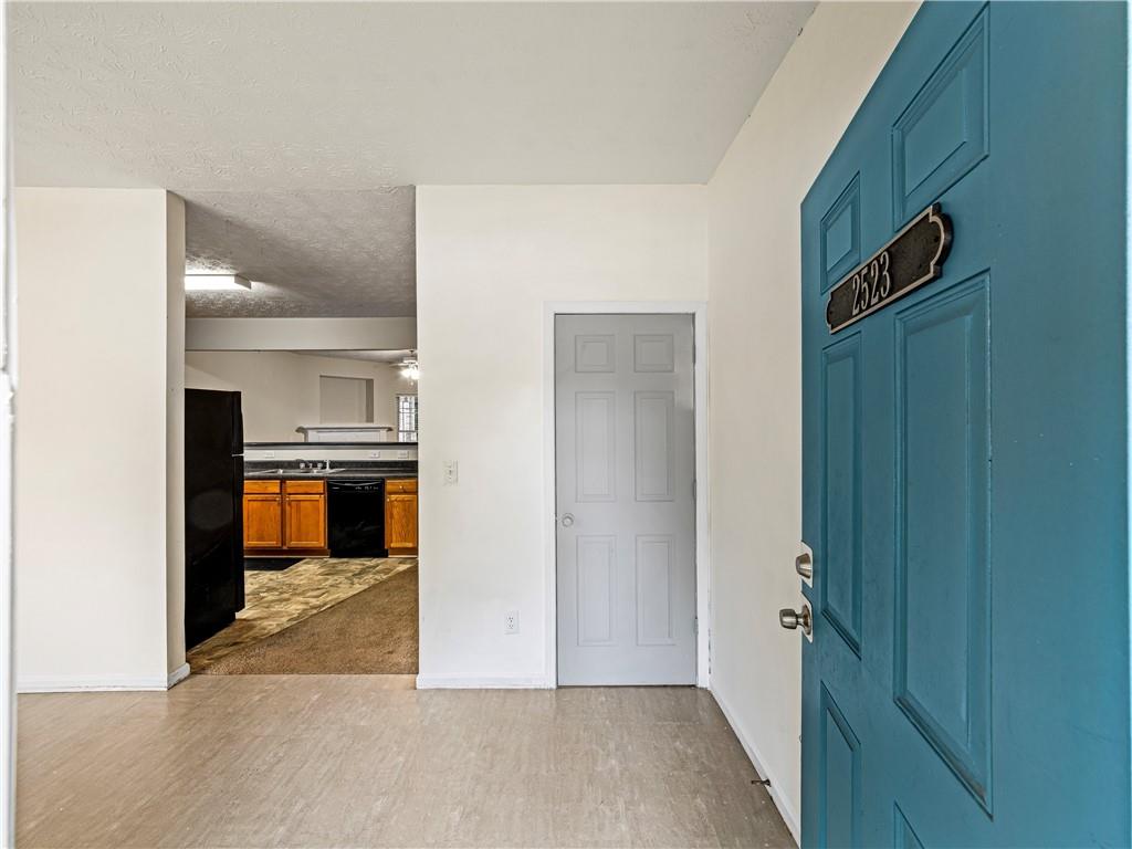 2523 Walden Lake Drive Decatur, GA 30035 - Photo 2 of 18 a view of kitchen with refrigerator and cabinets