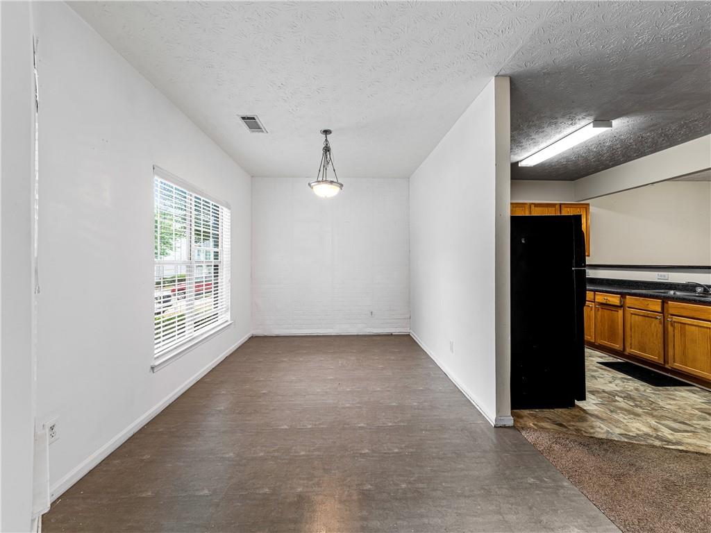 2523 Walden Lake Drive Decatur, GA 30035 - Photo 3 of 18 an empty room with windows and closet