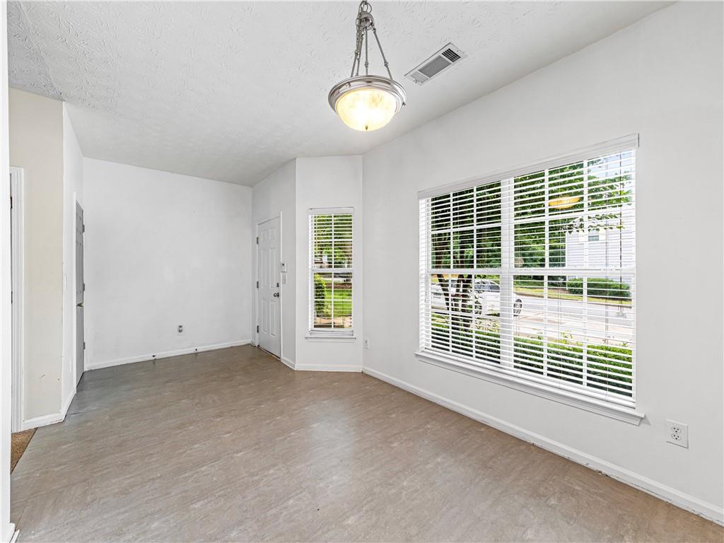 2523 Walden Lake Drive Decatur, GA 30035 - Photo 4 of 18 a view of an empty room with a window