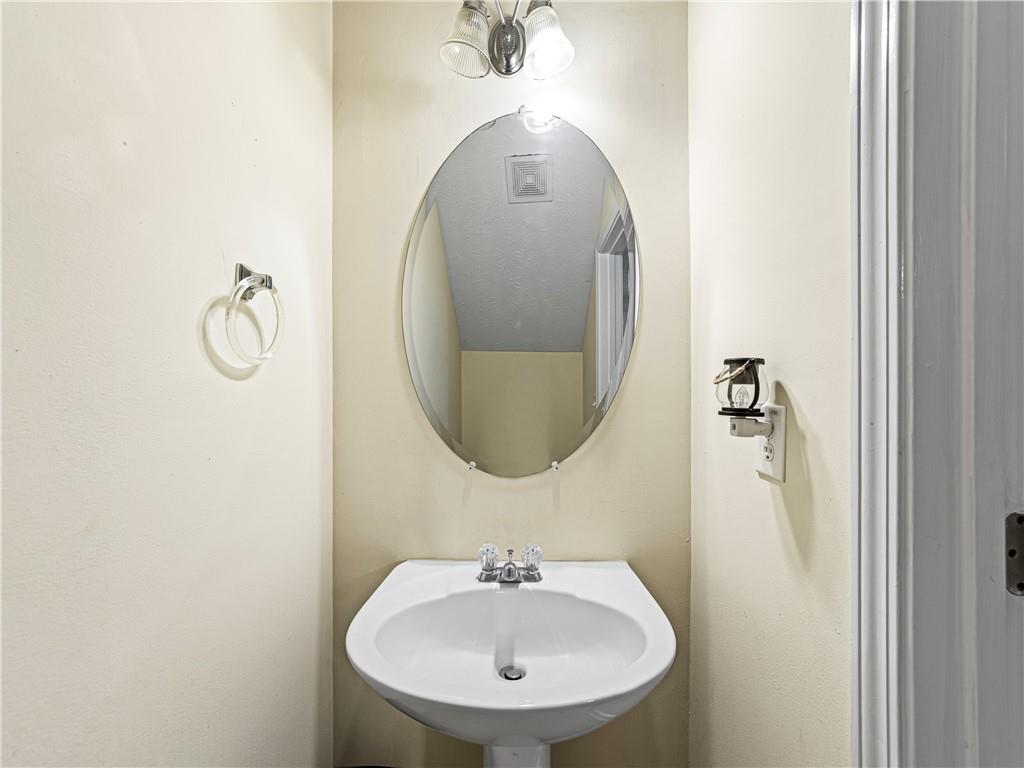 2523 Walden Lake Drive Decatur, GA 30035 - Photo 10 of 18 a bathroom with a sink and mirror