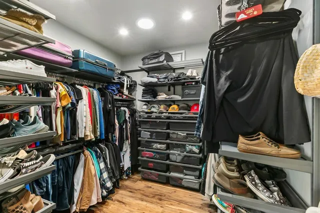 a bathroom with a sink and a large mirror