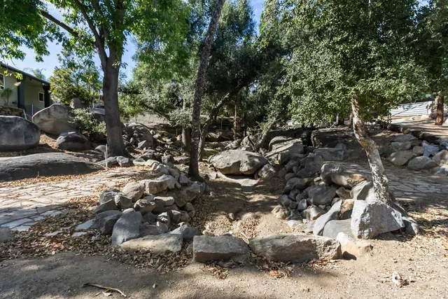 a view of multiple houses with a yard