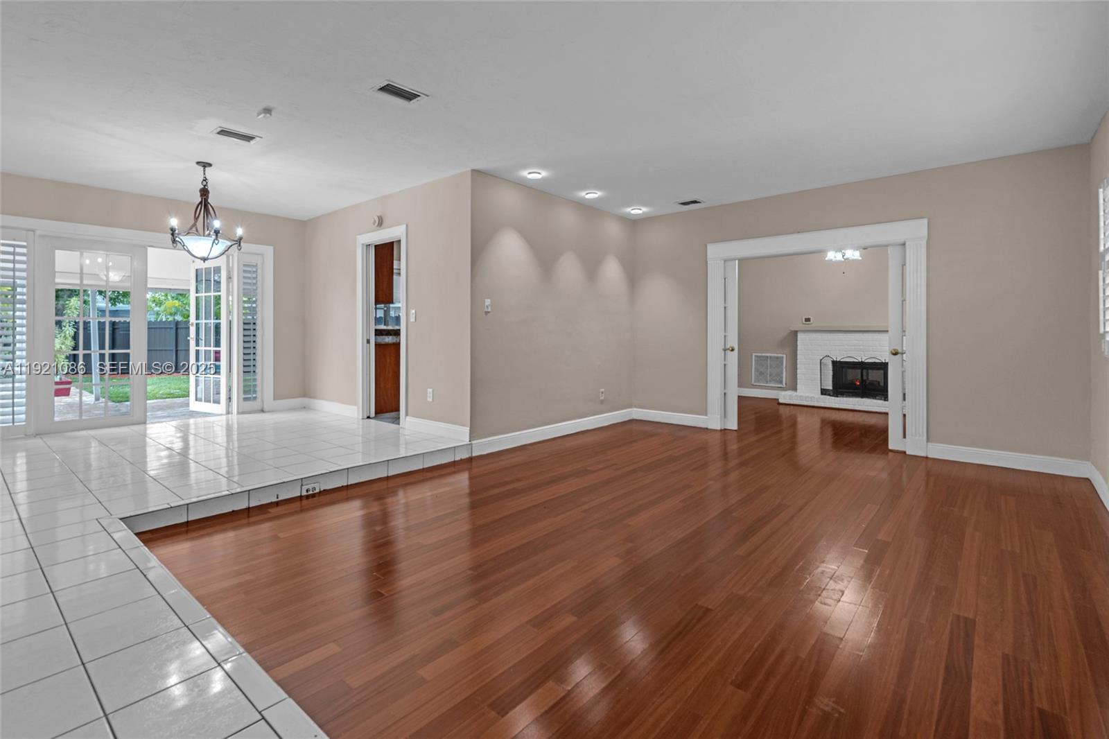 9400 Southwest 193rd Drive, Unit 9400 Cutler Bay, FL 33157 - Photo 21 of 42 a view of empty room with wooden floor and fan